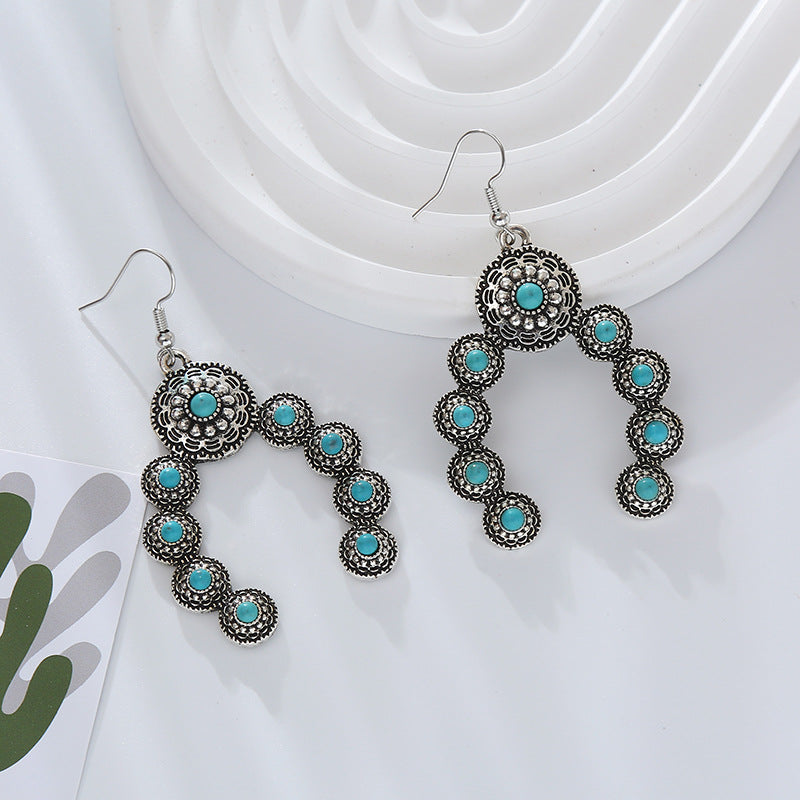 Cross-border Amazon independent station hot sale earrings, European and American retro alloy inlaid turquoise, creative exaggerated temperament earrings