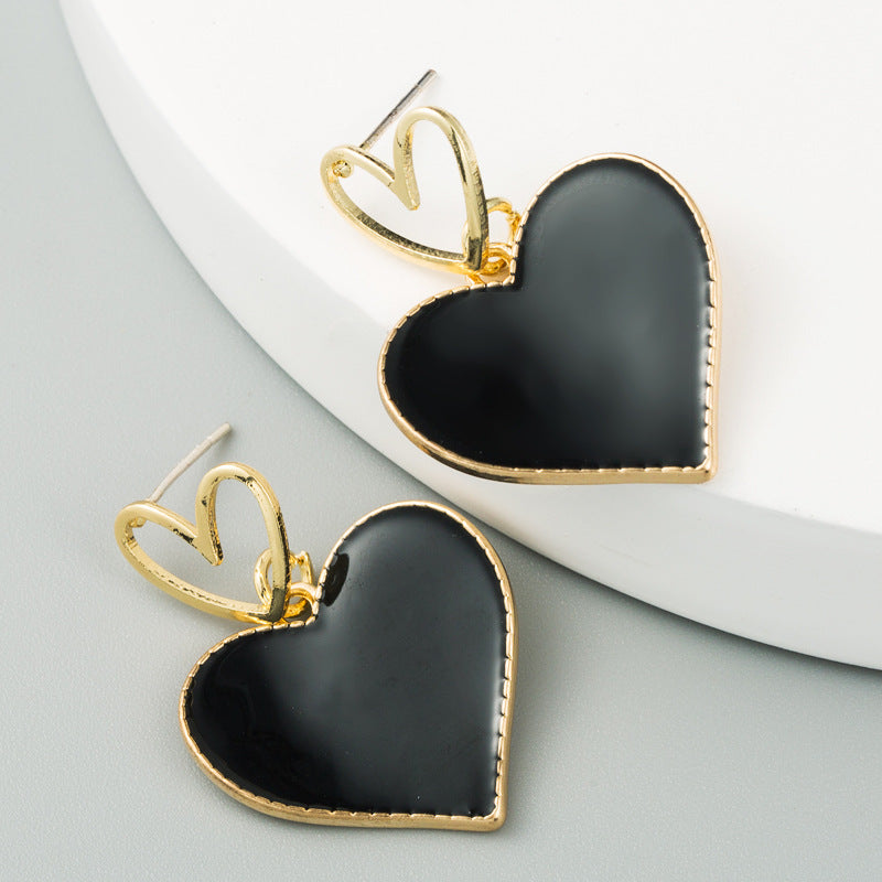 South Korea Dongdaemun small fresh double heart earrings heart-shaped dripping oil hollow alloy earrings women's S925 silver needle earrings