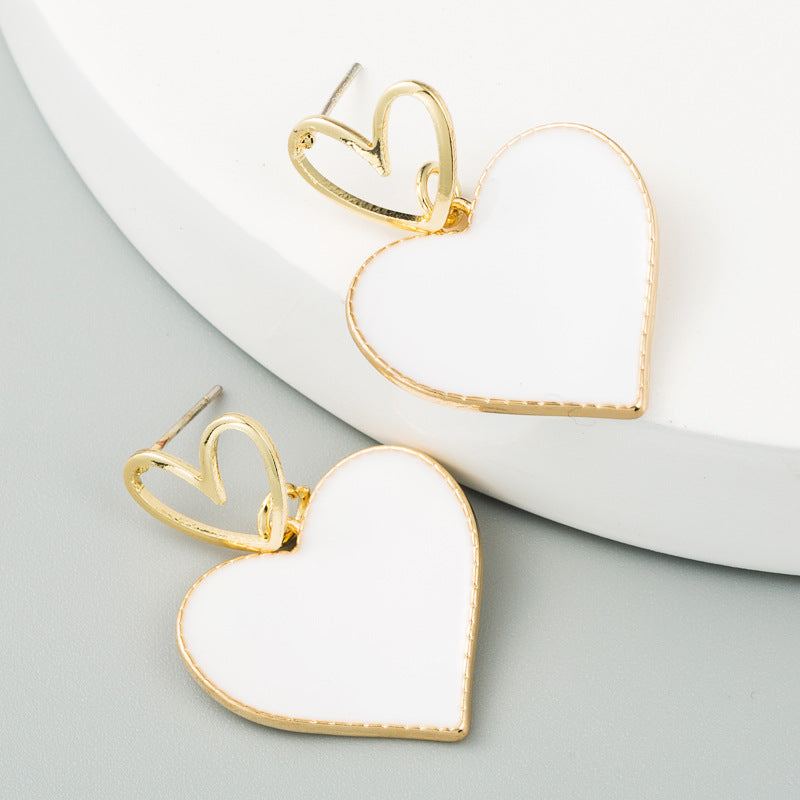 South Korea Dongdaemun small fresh double heart earrings heart-shaped dripping oil hollow alloy earrings women's S925 silver needle earrings