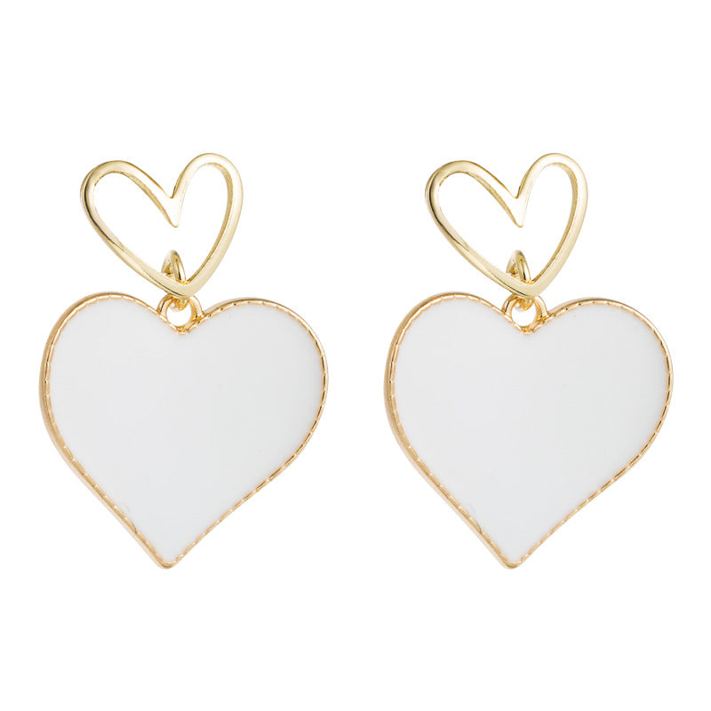 South Korea Dongdaemun small fresh double heart earrings heart-shaped dripping oil hollow alloy earrings women's S925 silver needle earrings