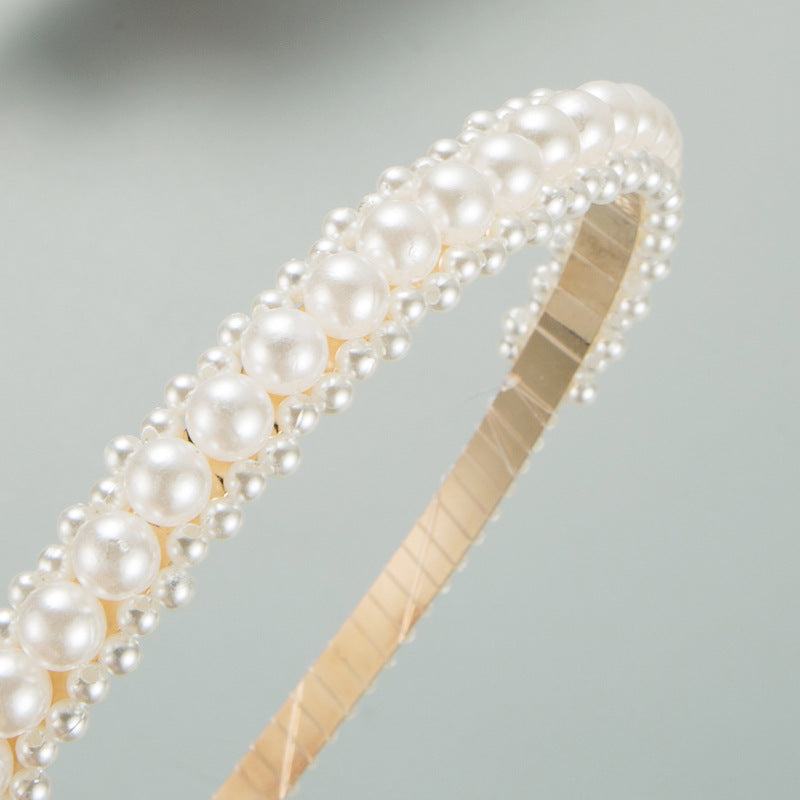 Korean version of sweet temperament, metal pearl entwined thin headband, European and American ins, fashionable, simple bridal headband hair accessories