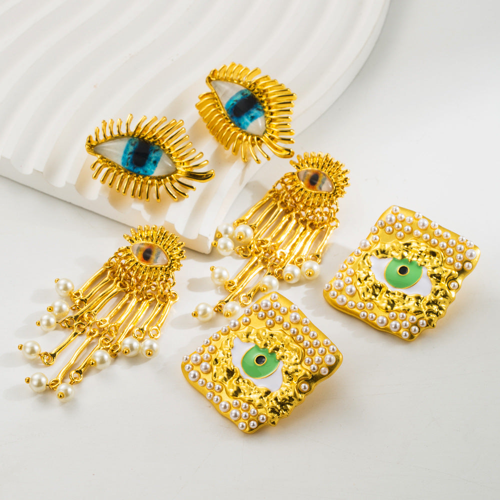 European and American vintage antique gold exaggerated devil's eye silver needle earrings female alloy dripping oil inlaid resin pearl earrings