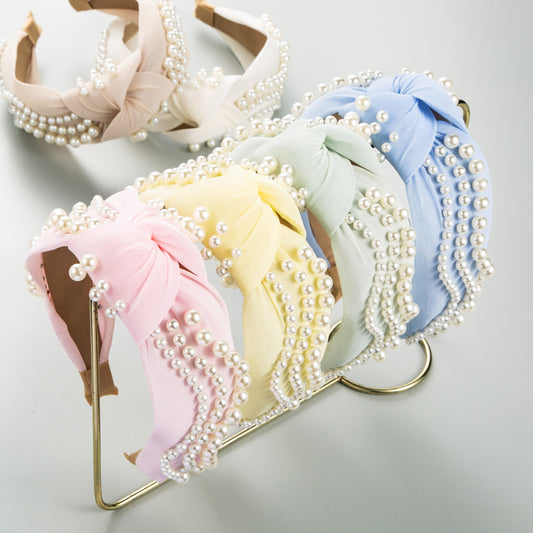 Korean version of the new summer temperament fashion pearl headband fresh and sweet, wide-brimmed twisted headband, hairpin card, wild hair accessory