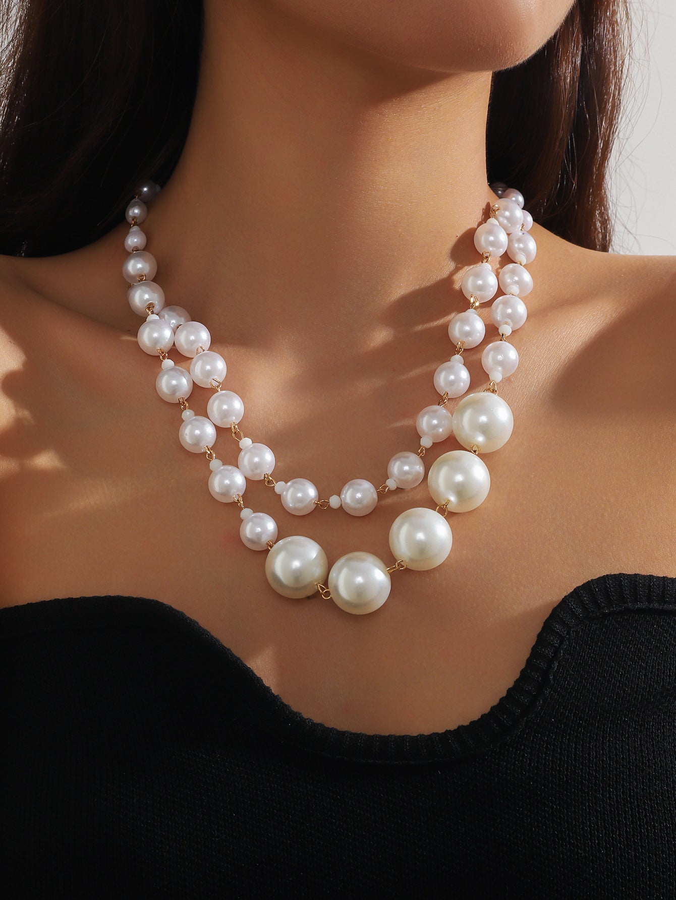 The new retro luxury niche temperament multi-layer pearl stacked clavicle chain necklace is fashionable and versatile