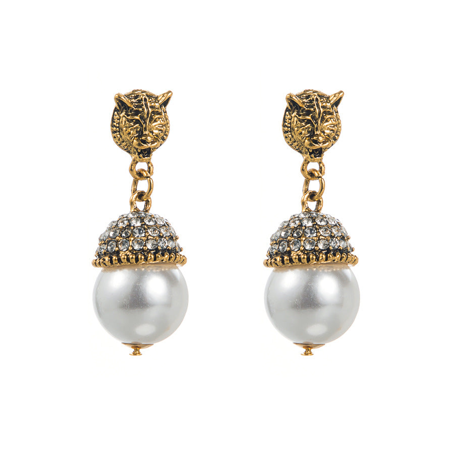 European and American fashion personality rhinestone pearl stud earrings women's foreign trade hot retro high-end temperament animal tiger head earrings