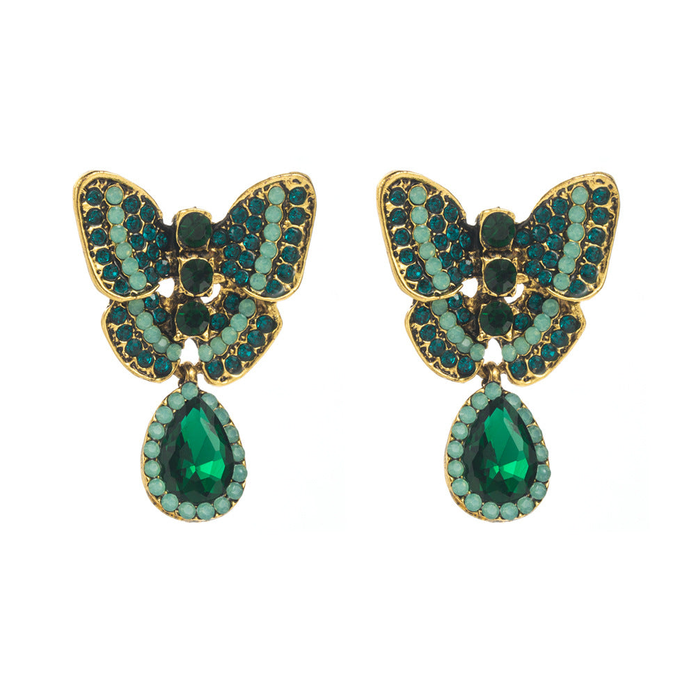 Korean version of 925 silver needle temperament small butterfly earrings female high-end sweet cool ins feng shui drop pendant party earrings