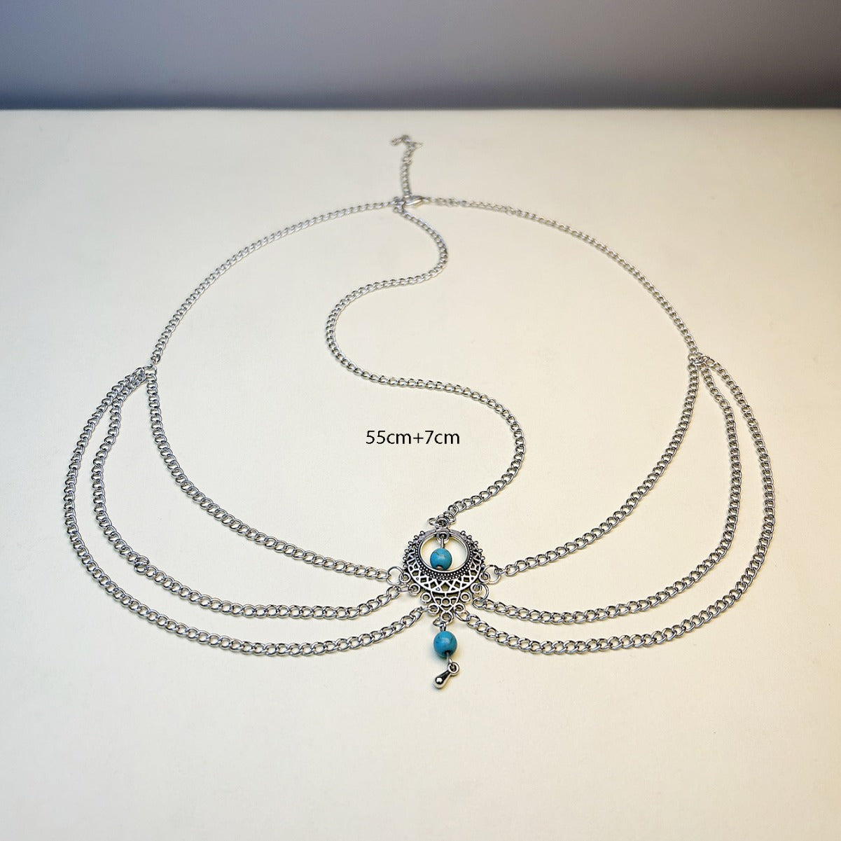 The new foreign trade hair ornament is European and American retro ethnic style hollow turquoise water drop tassel multi-layer simple hair head bracelet