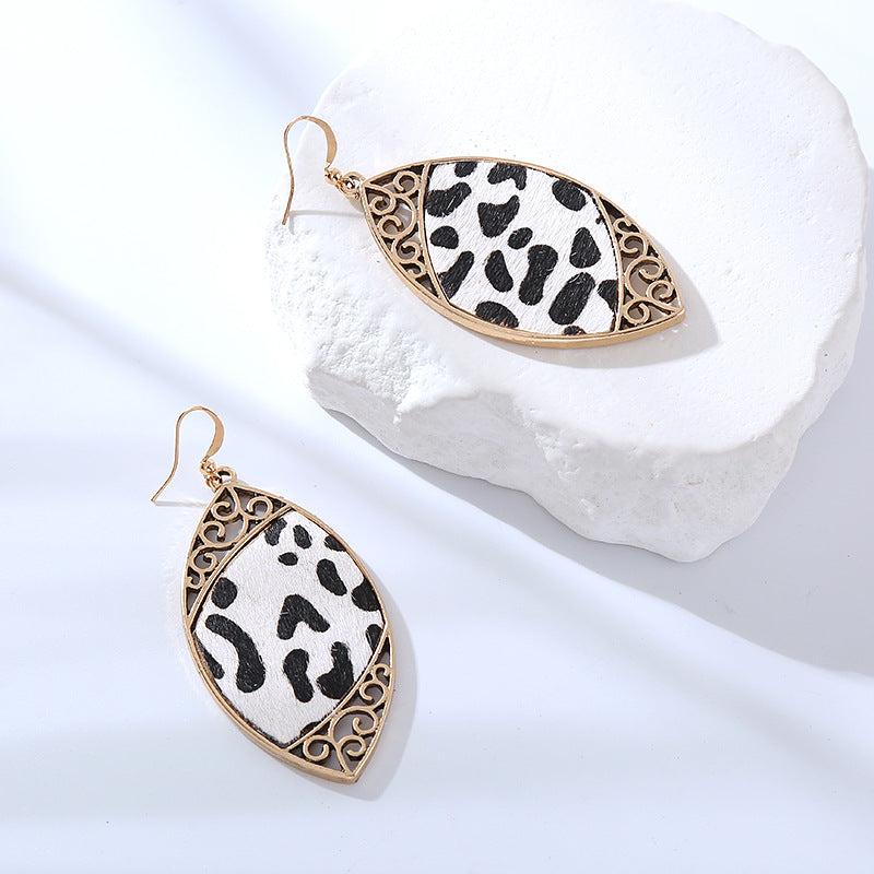 Cross-border new trendy street photography earrings, alloy diamonds, cow leather earrings, personality, creativity, exaggerated earrings wholesale