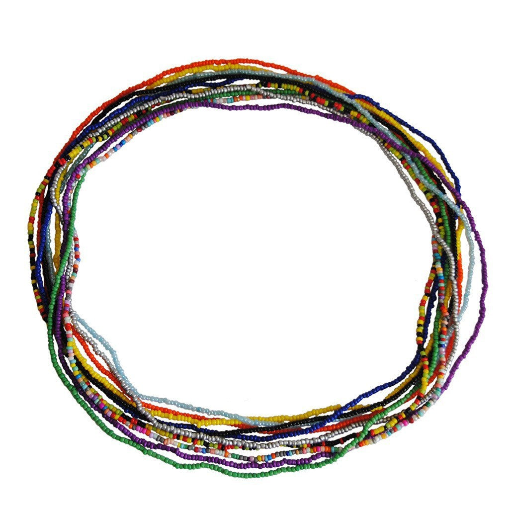 The new European and American cross-border simple single-layer hand-beaded body chain is versatile and contrasting mixed with rice beads elastic waist chain
