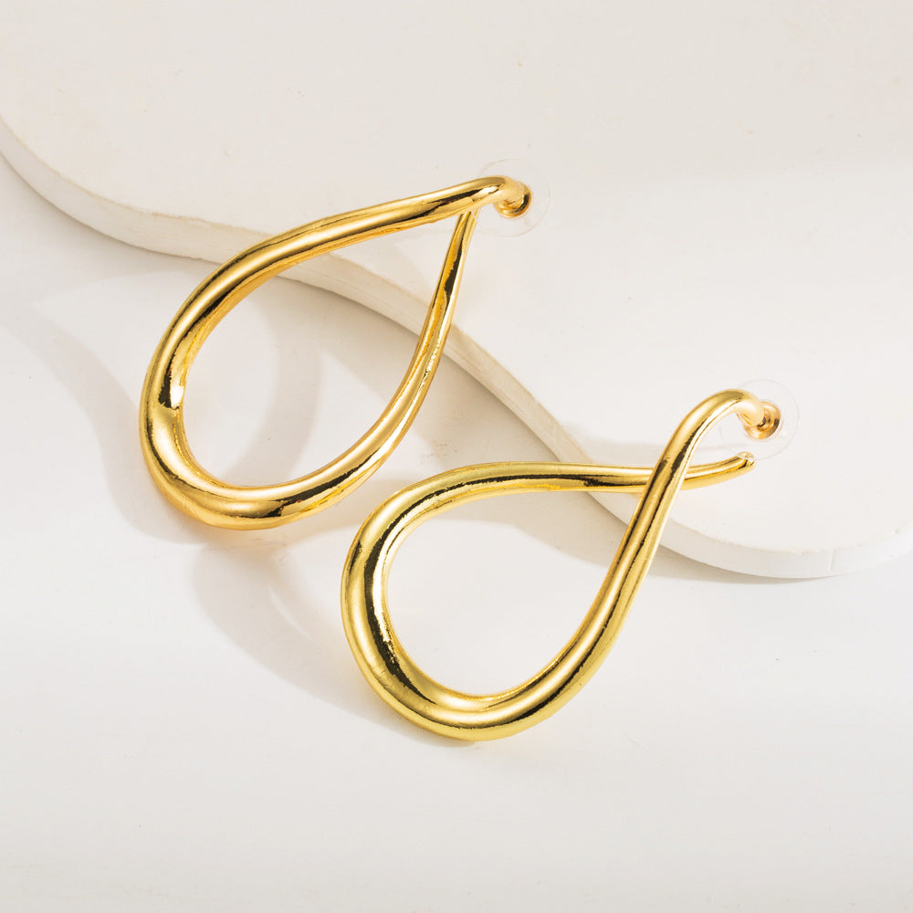 Cross-border new ZA exaggerated cold wind irregular silver needle earrings niche curved geometric alloy earrings women