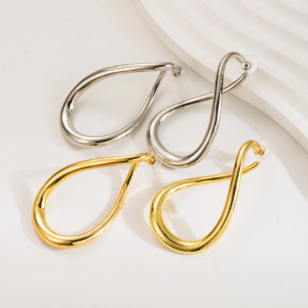 Cross-border new ZA exaggerated cold wind irregular silver needle earrings niche curved geometric alloy earrings women