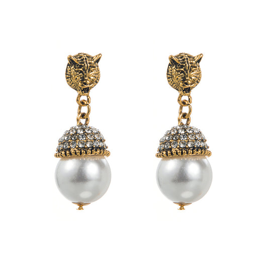 European and American fashion personality rhinestone pearl stud earrings women's foreign trade hot retro high-end temperament animal tiger head earrings