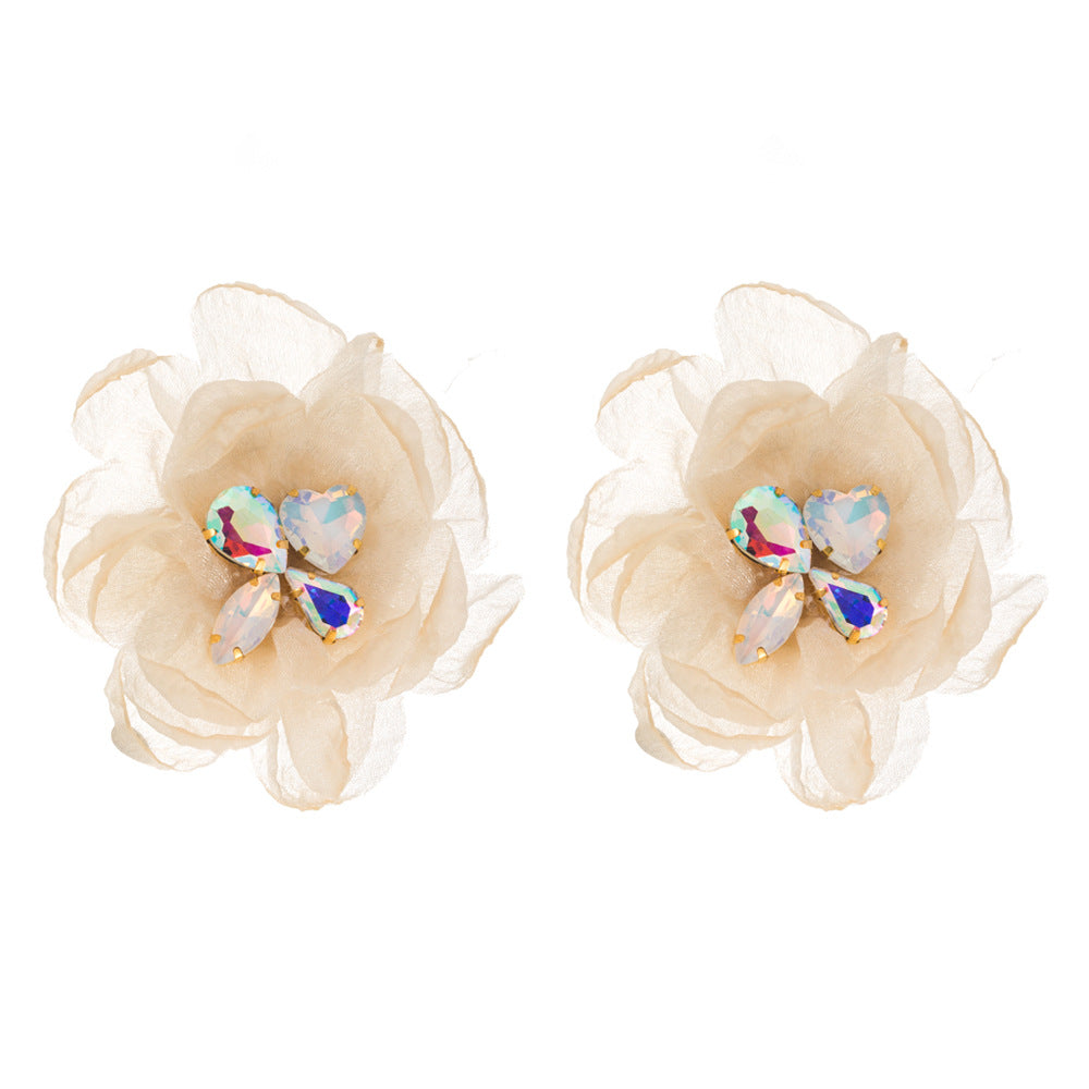 Korean version of resort style mesh flower inlaid diamond earrings sweet girly stud earrings Sen niche sweet fairy earrings