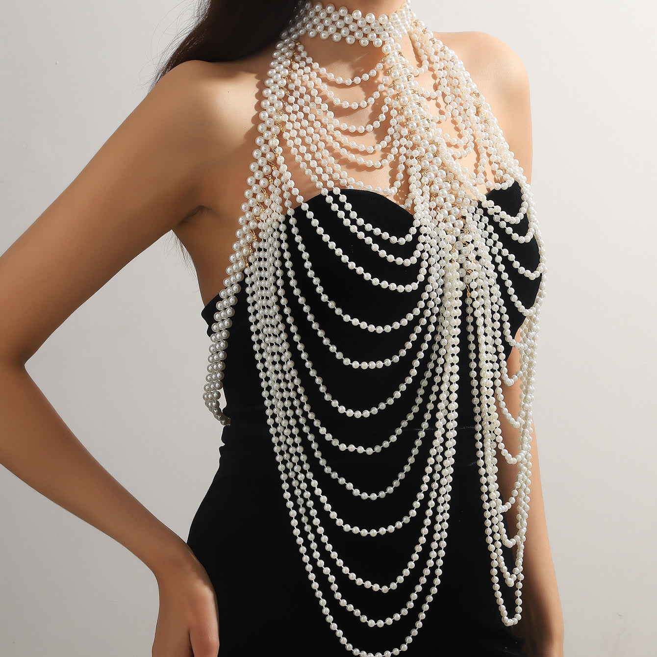 New European and American jewelry, fashionable cut-out chest ornament, pearl wave shawl, chest chain, tassel, multi-layered body chain