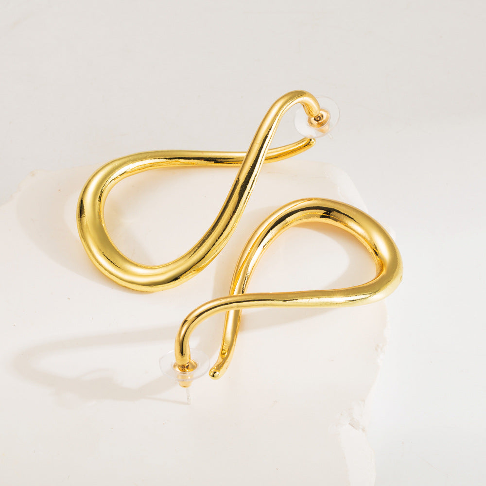 Cross-border new ZA exaggerated cold wind irregular silver needle earrings niche curved geometric alloy earrings women