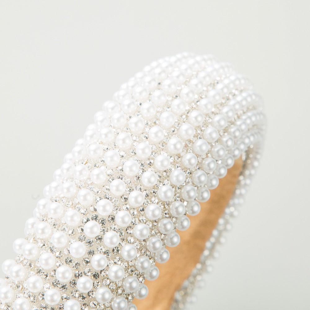 The Korean version of the new light luxury rhinestone pearl headband sponge high skull top headband inlaid with diamonds wide-brimmed face and hair pressure headpiece female