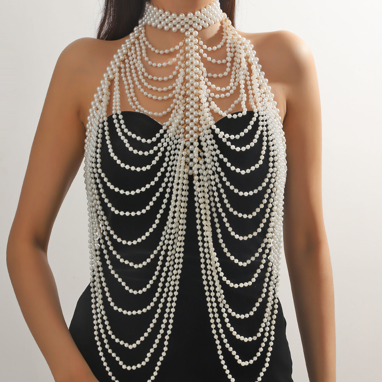 New European and American jewelry, fashionable cut-out chest ornament, pearl wave shawl, chest chain, tassel, multi-layered body chain