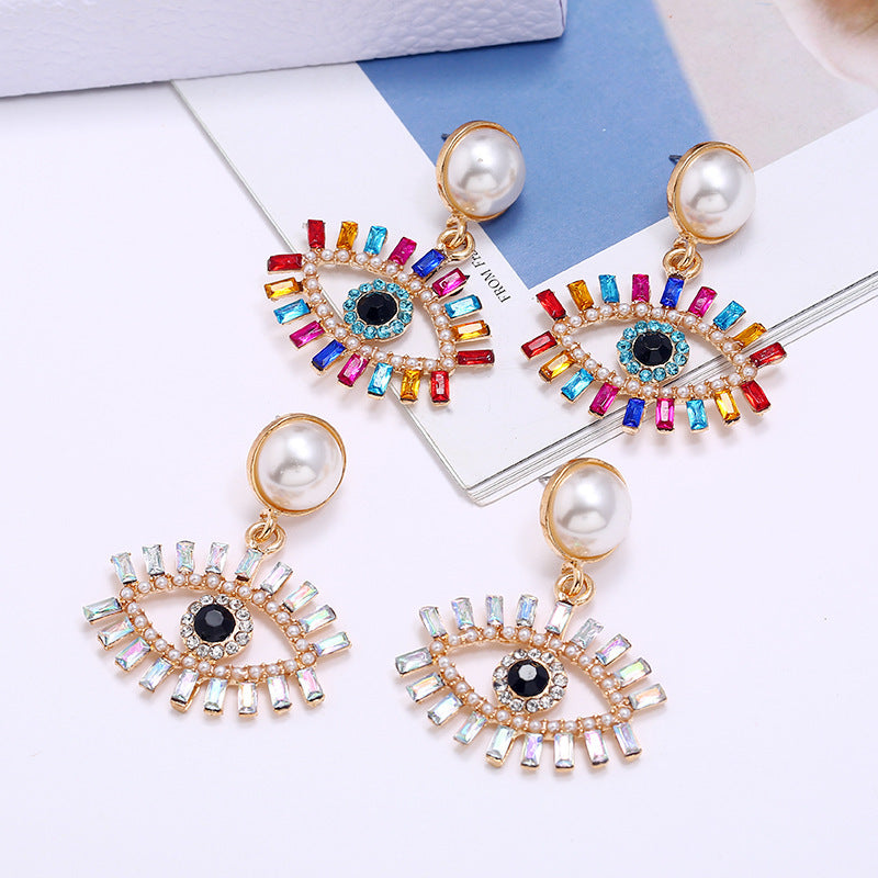 European and American fashion exaggerated devil's eye, pearl alloy earrings, women's colored diamonds, super flash, personality Internet celebrity earrings, earrings