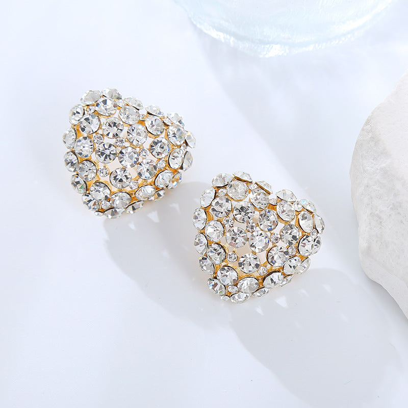 European and American fashion super flash heart-shaped versatile earrings exaggerated earrings female rhinestone full of diamonds peach heart stud earrings wholesale