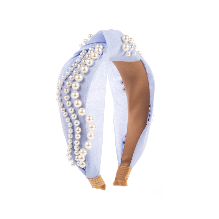 Korean version of the new summer temperament fashion pearl headband fresh and sweet, wide-brimmed twisted headband, hairpin card, wild hair accessory