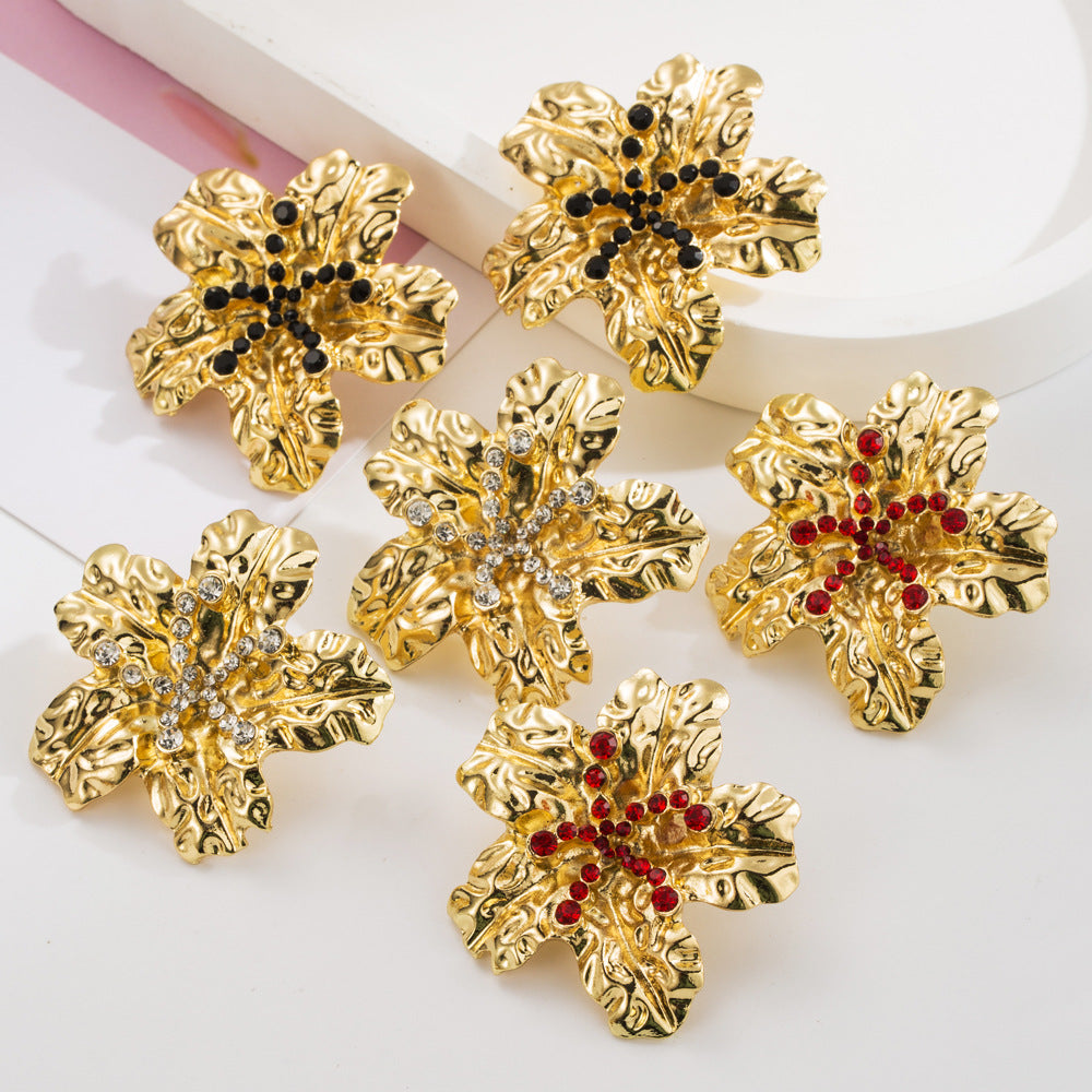 European and American fashion alloy flower stud earrings metal flowers simple high-end S925 silver needle earrings women