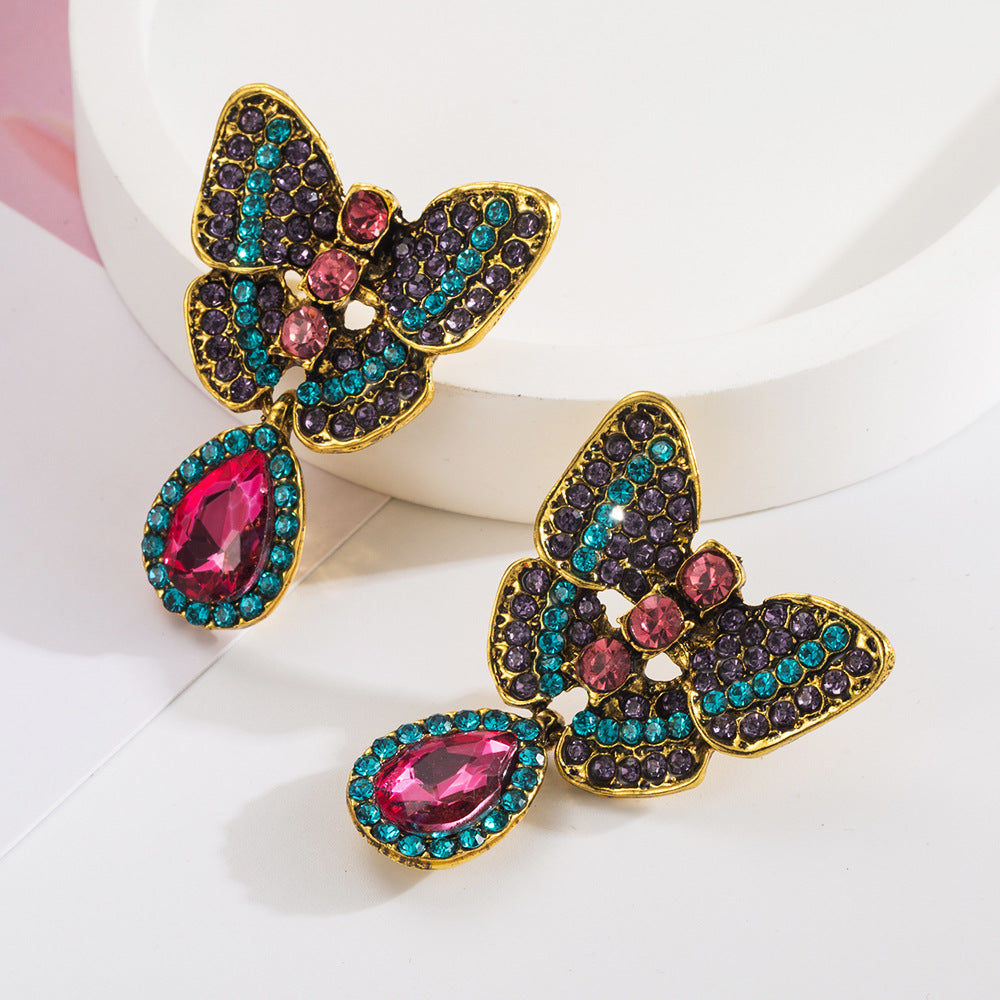 Korean version of 925 silver needle temperament small butterfly earrings female high-end sweet cool ins feng shui drop pendant party earrings