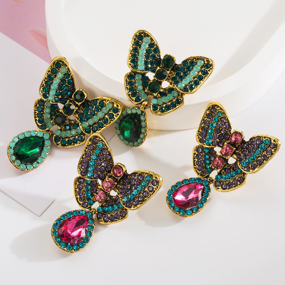 Korean version of 925 silver needle temperament small butterfly earrings female high-end sweet cool ins feng shui drop pendant party earrings
