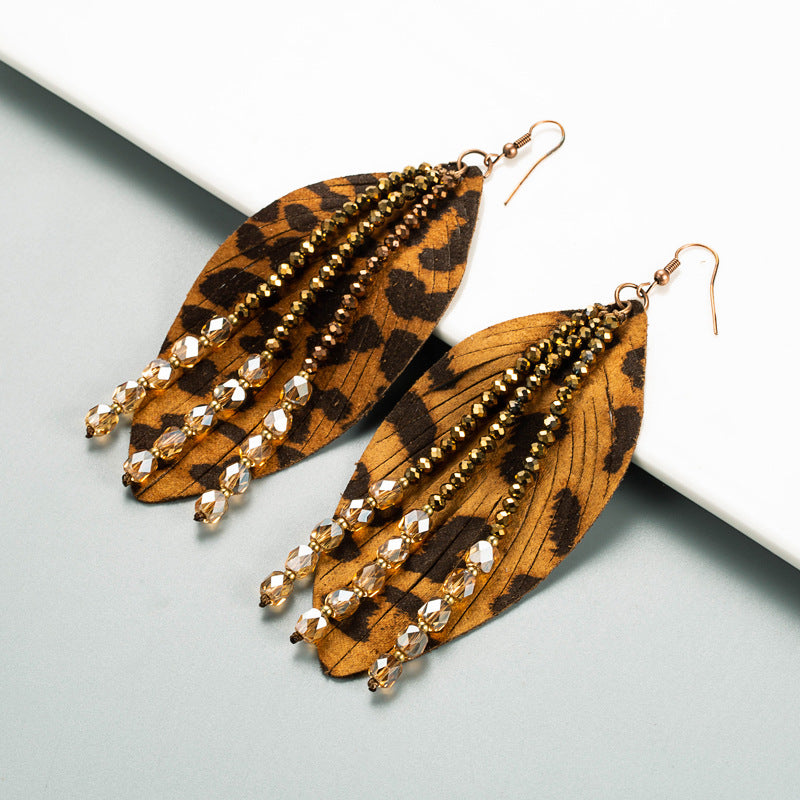 Cross-border hot personality leather earrings, leaf-shaped leopard leather crystal tassels, high-quality niche exaggerated earrings