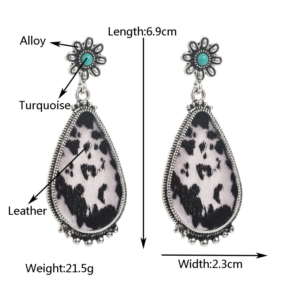 Cross-border new retro leopard print exaggerated leather earrings, alloy inlaid white green pine trend earrings, independent station hit