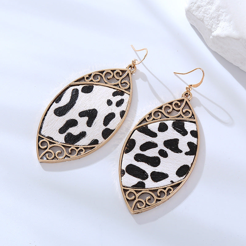 Cross-border new trendy street photography earrings, alloy diamonds, cow leather earrings, personality, creativity, exaggerated earrings wholesale