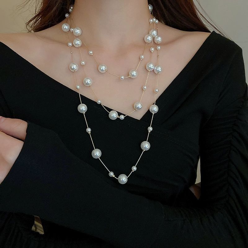 Super fairy long pearl necklace, trendy temperament, palace style, niche design, clavicle chain, delicate and gentle sweater chain