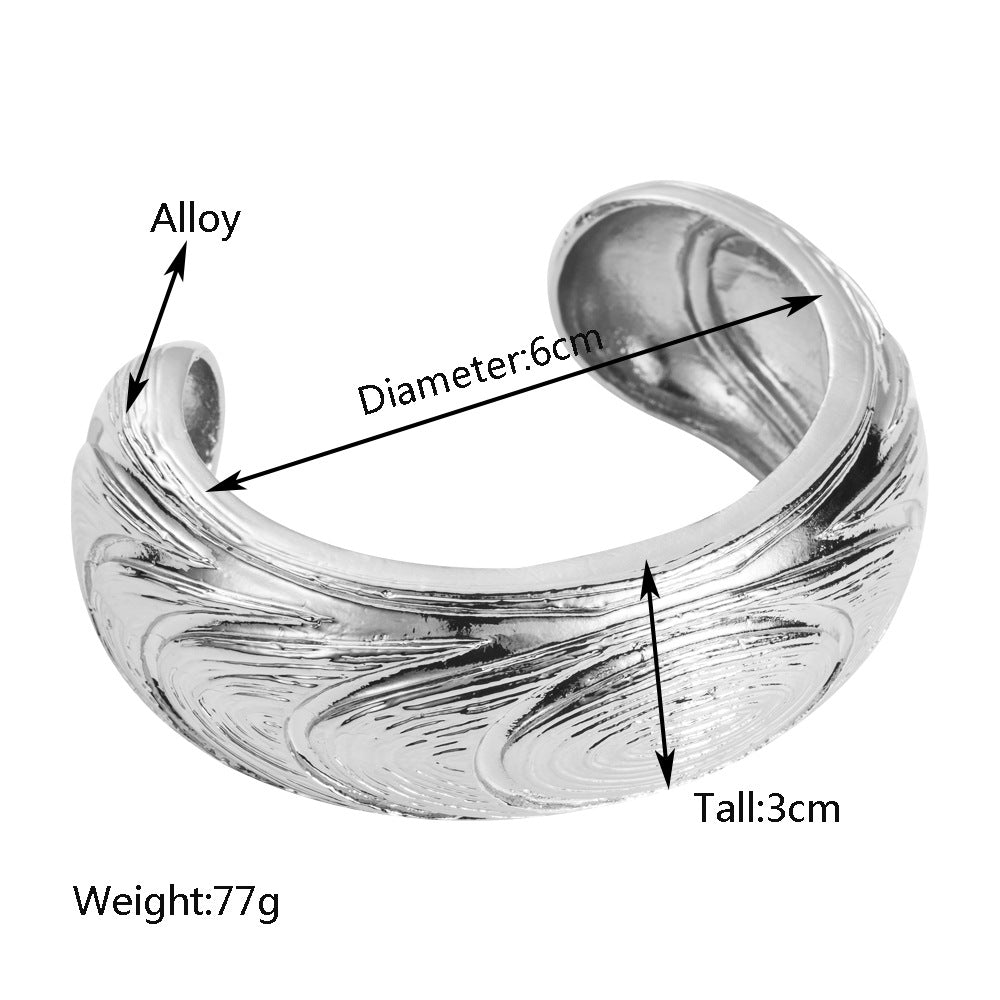 European and American fashion three-dimensional embossed water wave texture open bracelet simple and versatile, fashionable temperament, light luxury hand accessories wholesale