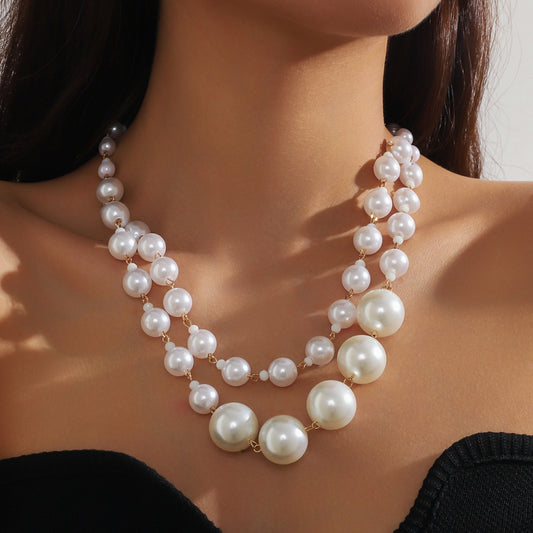 The new retro luxury niche temperament multi-layer pearl stacked clavicle chain necklace is fashionable and versatile