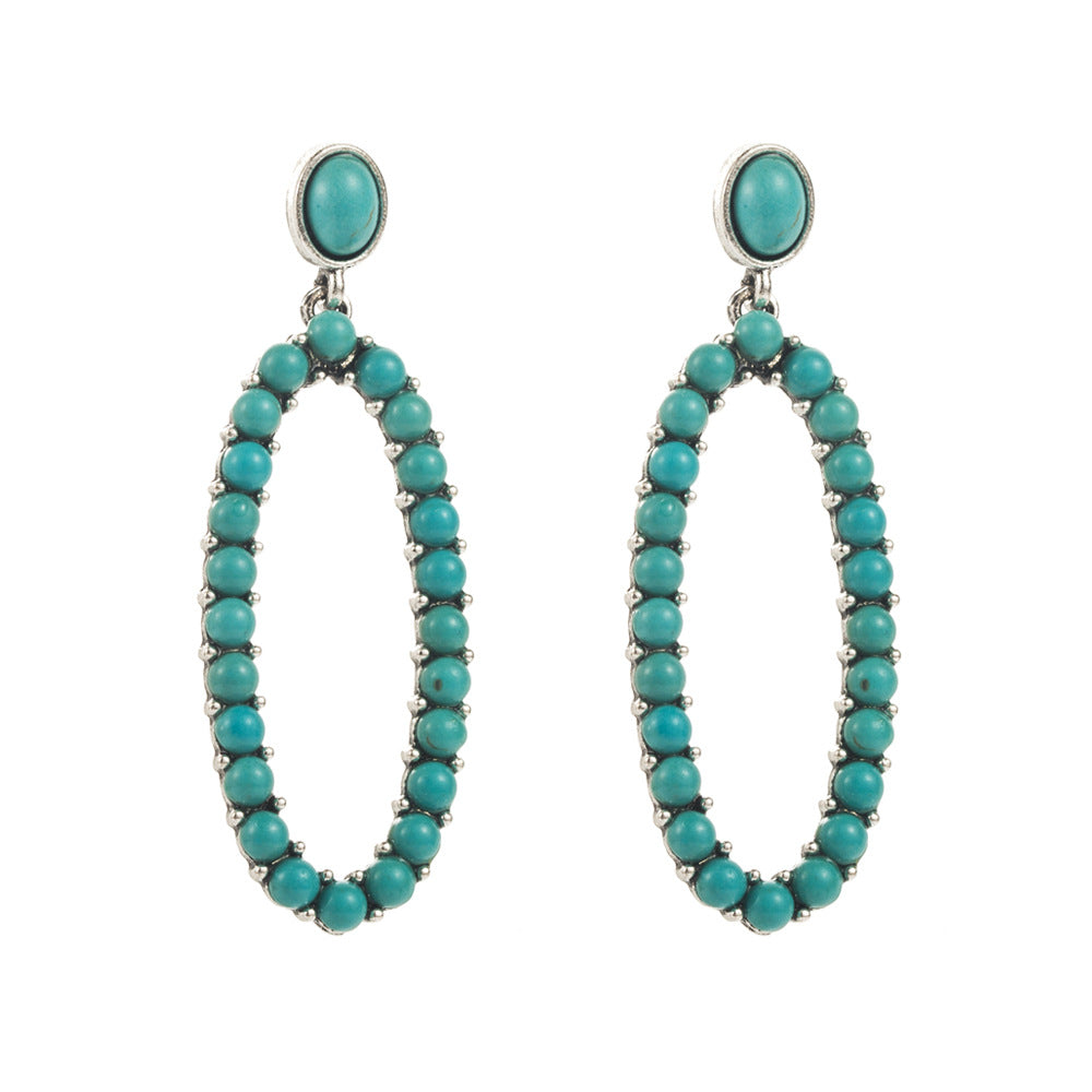 Cross-border new retro leopard print exaggerated leather earrings, alloy inlaid white green pine trend earrings, independent station hit
