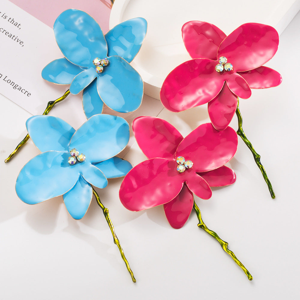 Korean alloy dripping oil flower stud earrings female high-end sense spring and summer petal super fairy earrings exaggerated fashion prom earrings