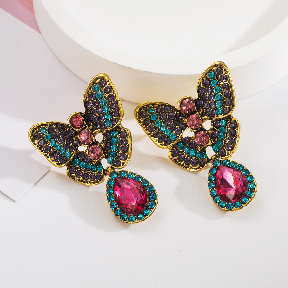 Korean version of 925 silver needle temperament small butterfly earrings female high-end sweet cool ins feng shui drop pendant party earrings