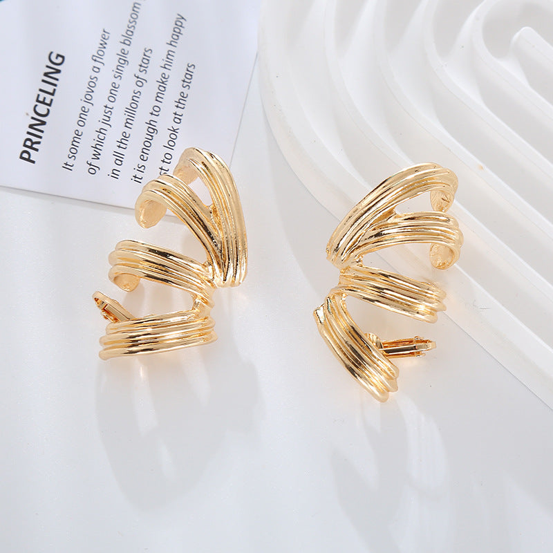 European and American new exaggerated spring-like alloy threaded silver pin earrings women's personality simple twist earrings earrings wholesale