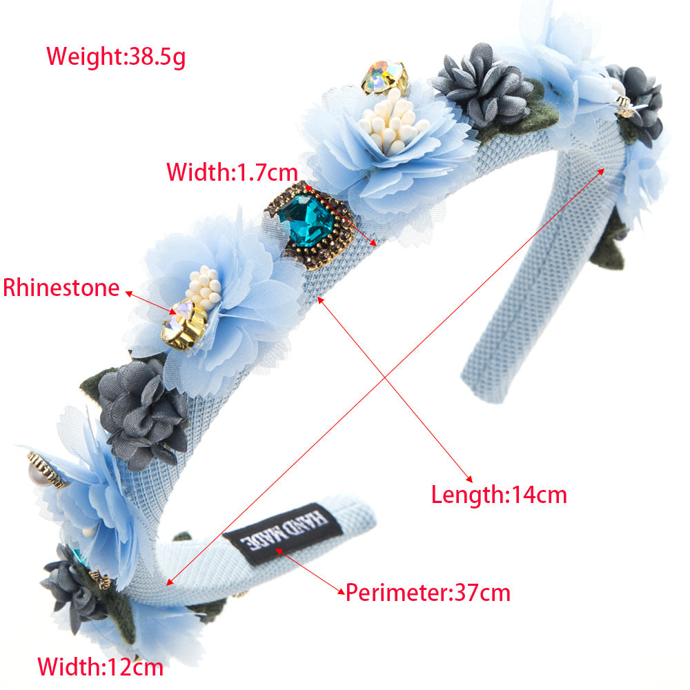 Korean version of the new mesh camellia with stamens ball headband female diamond pearl lady high skull top temperament hair ornament