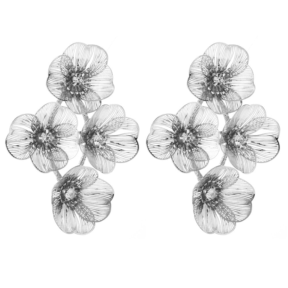 European and American cross-border new diamond-inlaid alloy flower earrings, women's light luxury trend, hollow texture, high-end evening earrings