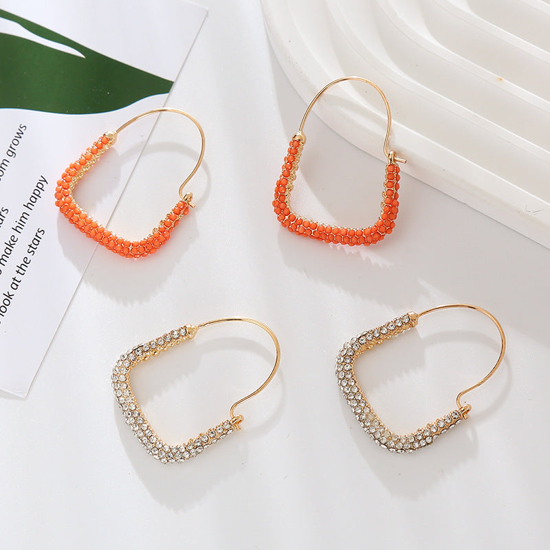 European and American new fashion, simple and trendy Internet celebrity earrings, women's personality, niche design, alloy and diamond geometric earrings