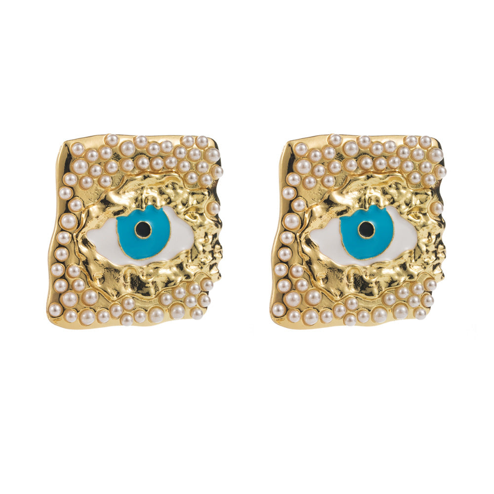 European and American fashion trend alloy dripping oil eye stud earrings inlaid with pearls personality exaggerated s925 silver needle party earrings female