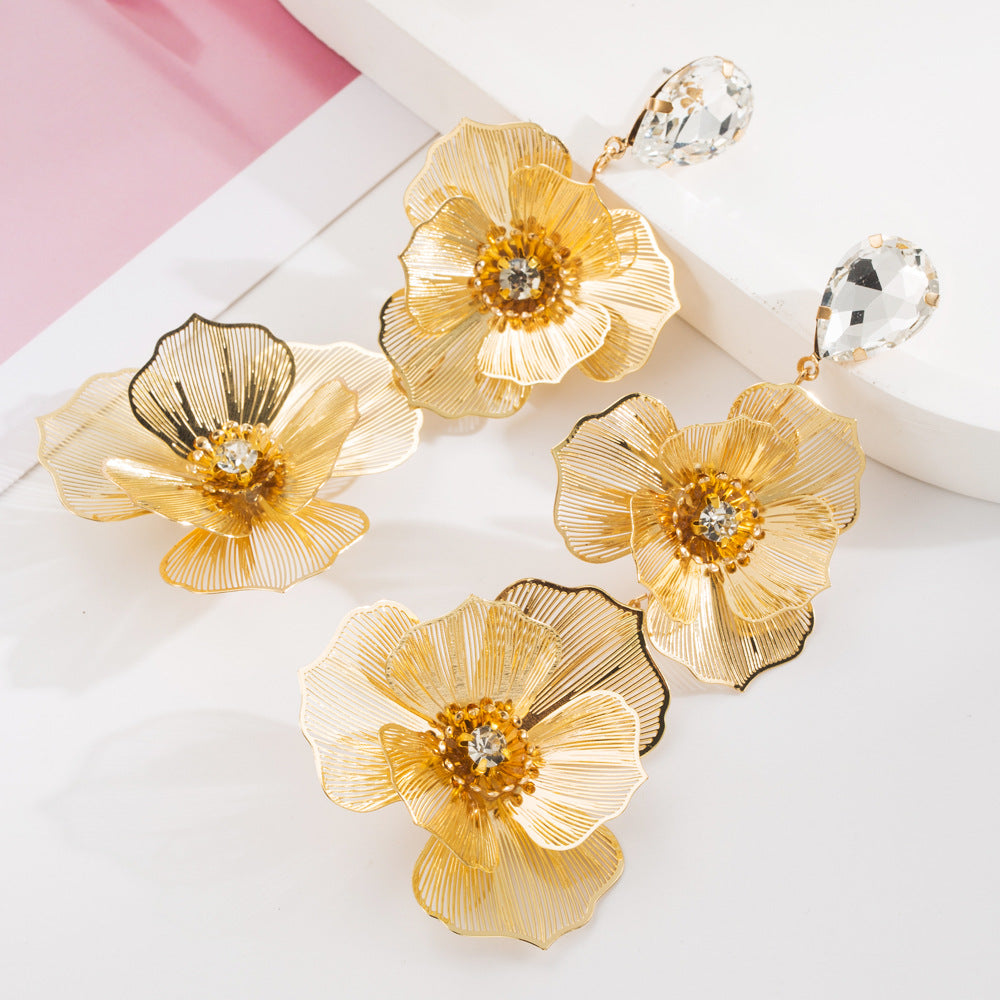 Cross-border new fashion hollow alloy flower earrings for women, simple and delicate, high-end exaggerated long temperament earrings