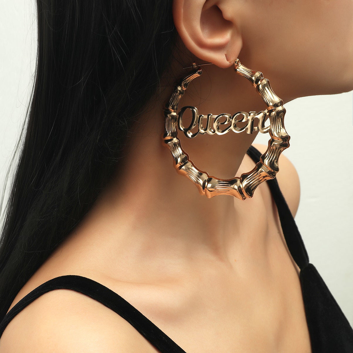 The new European and American jewelry round bamboo letter earrings have an exaggerated personality, metal design, and large earring earrings