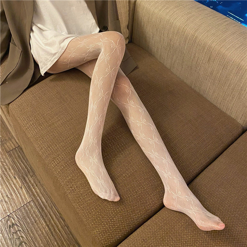 Sexy cut-out cute style small bow pantyhose Biu Mei nightclub jumping wild fishnet socks WK47